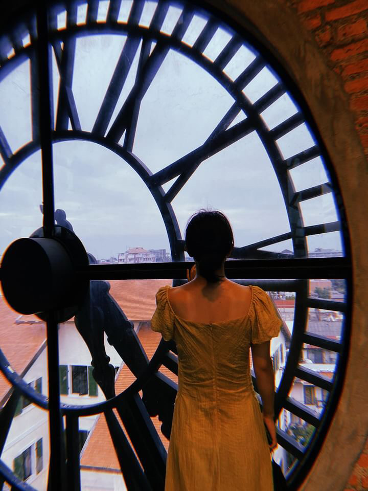 Watching out from a clock tower