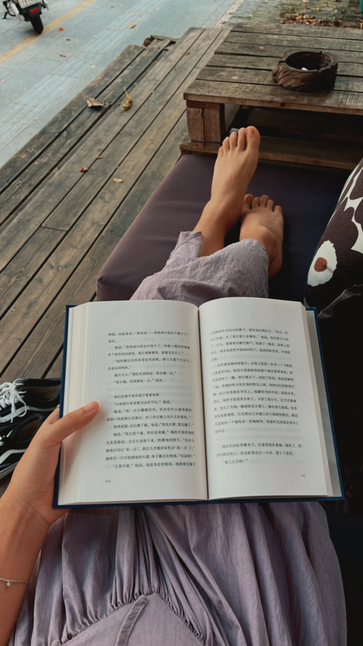 Reading by a coffee shop