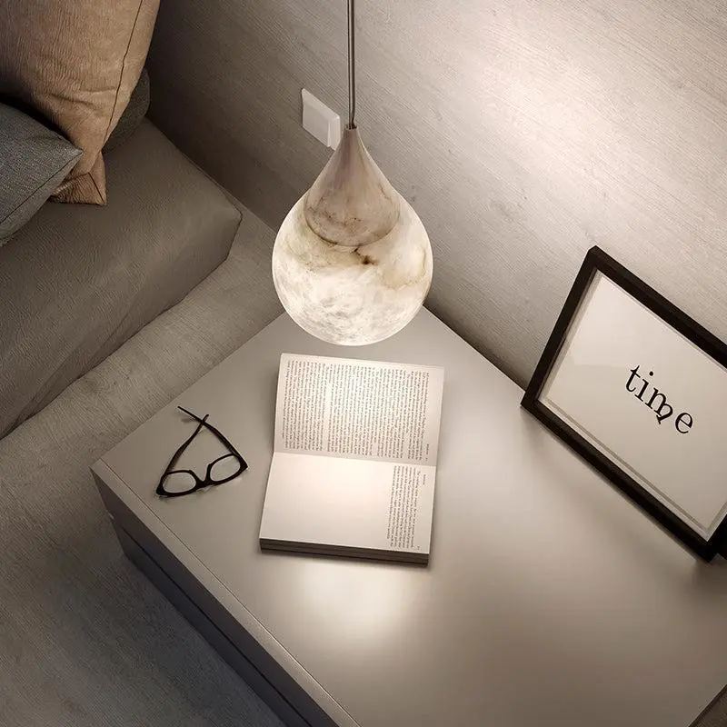 Reading under a beautiful alabaster lamp.