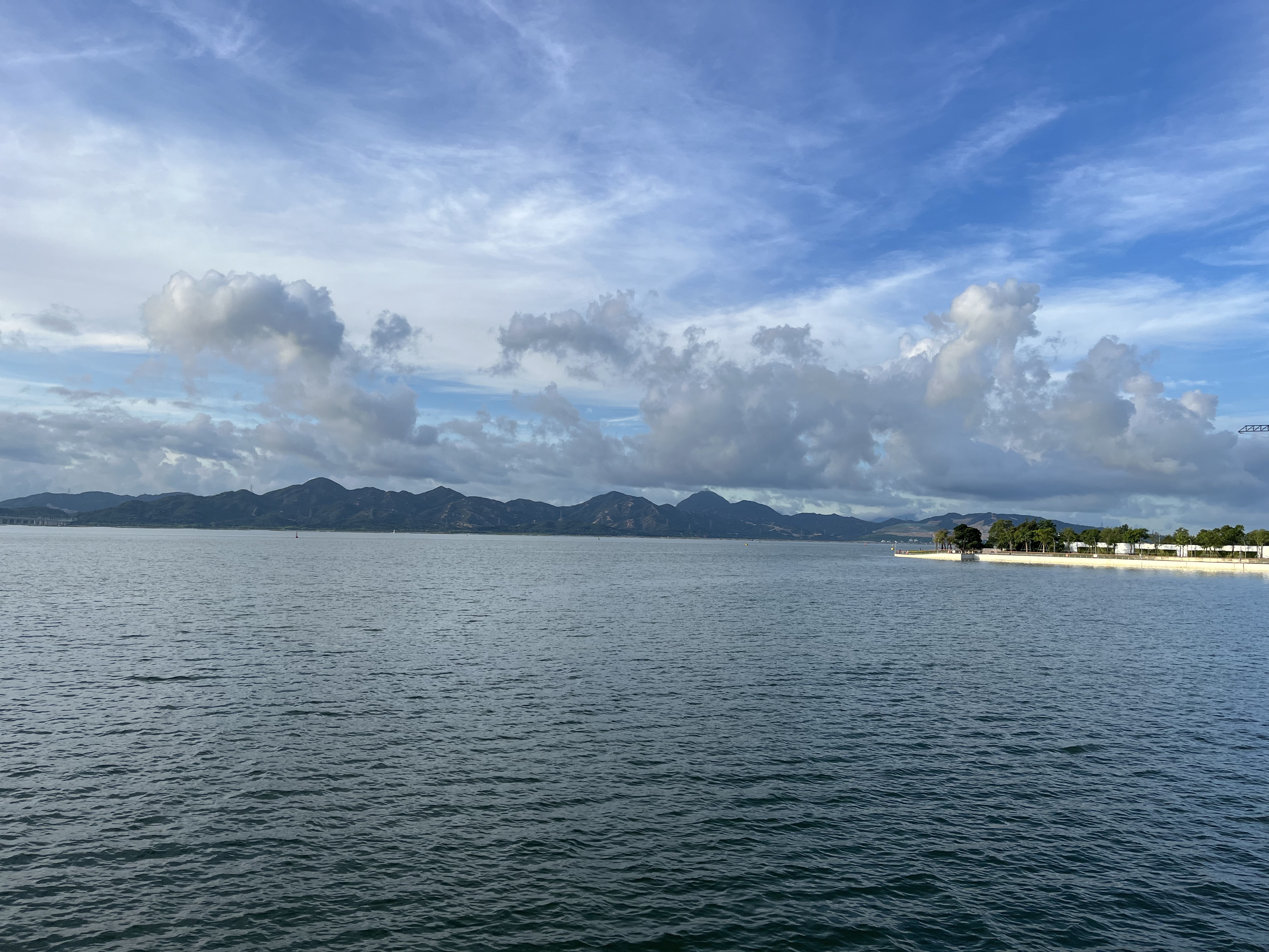 Morning seaside view with calm waters and soft light