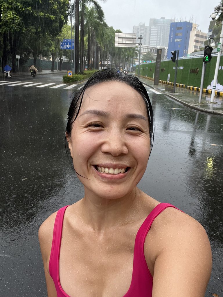 Selfie of Falls on a rainy morning street after a 10K run