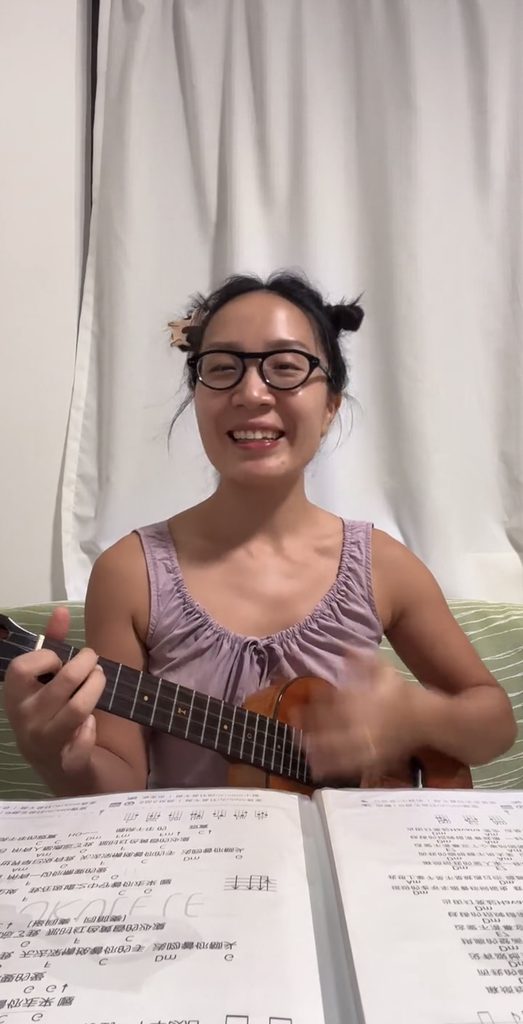 Falls playing the ukulele