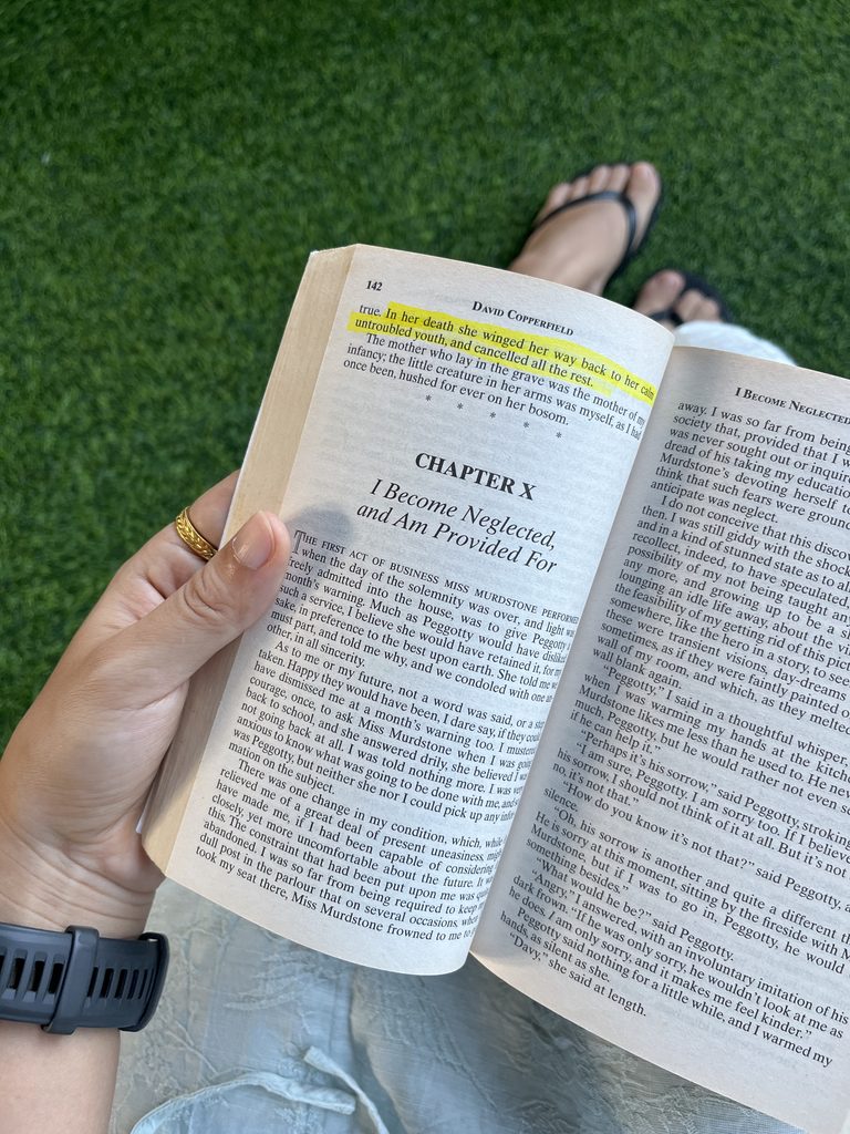 An open copy of David Copperfield during a Fallina reading session.